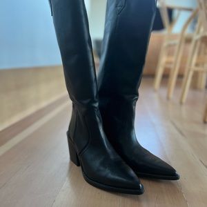 Leather tall cowboy style boots by Mango